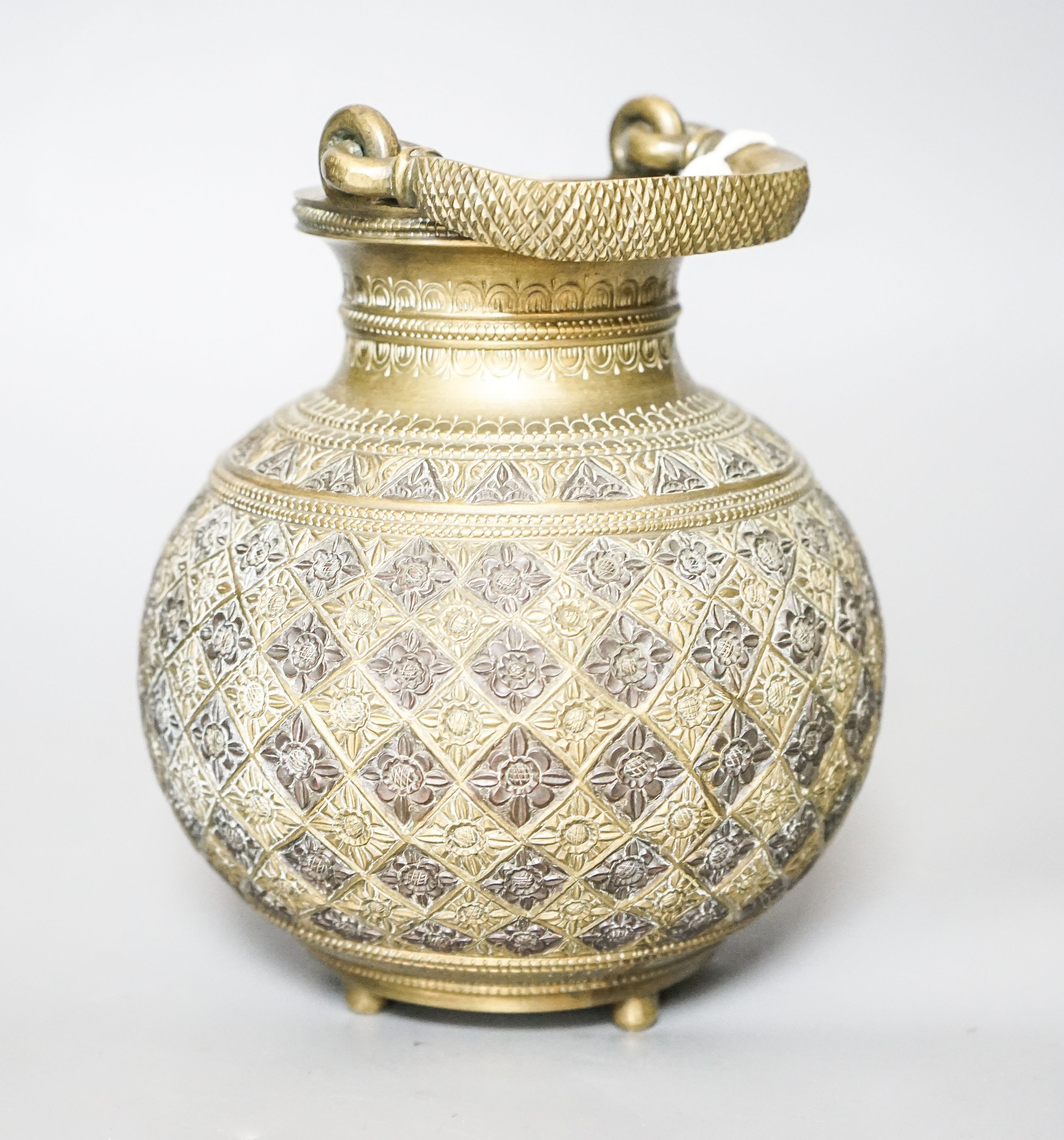 An Indian deccani bronze and copper water carrier 17cm
